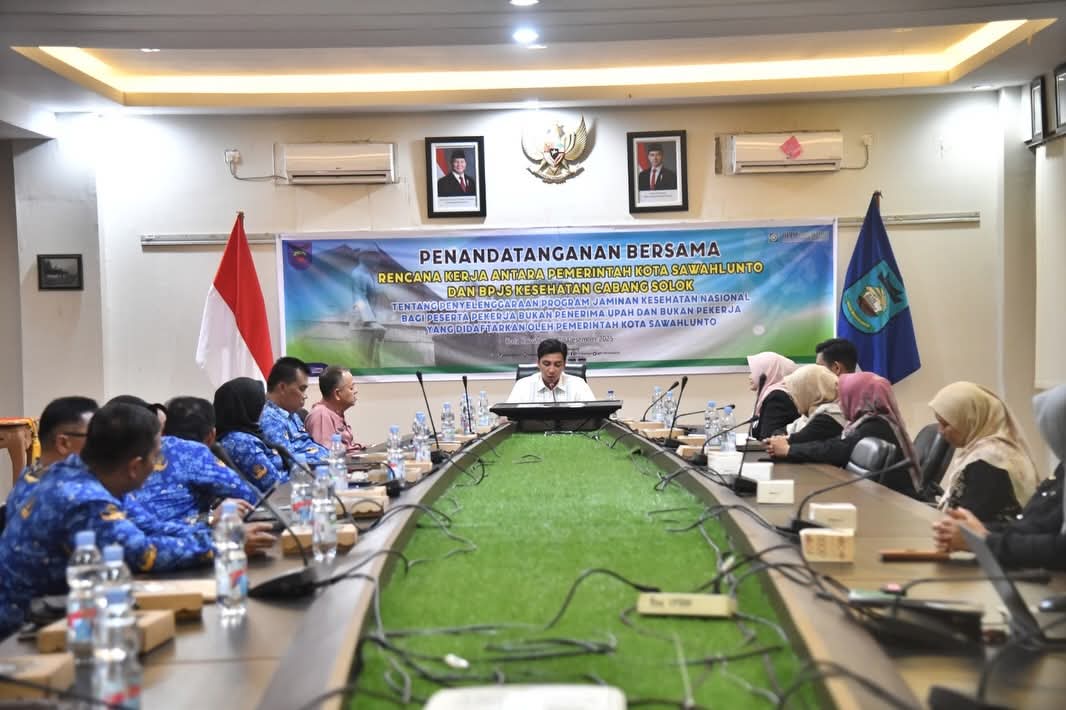 Wali Kota Sawahlunto Teken Kerja Sama  JKN dengan BPJS Kesehatan dan Nota Kesepahaman dengan Bawaslu