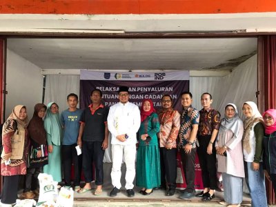 Pj Walikota Zefnihan  monitoring penyaluran Bantuan Cadangan  Beras Kota Sawahlunto